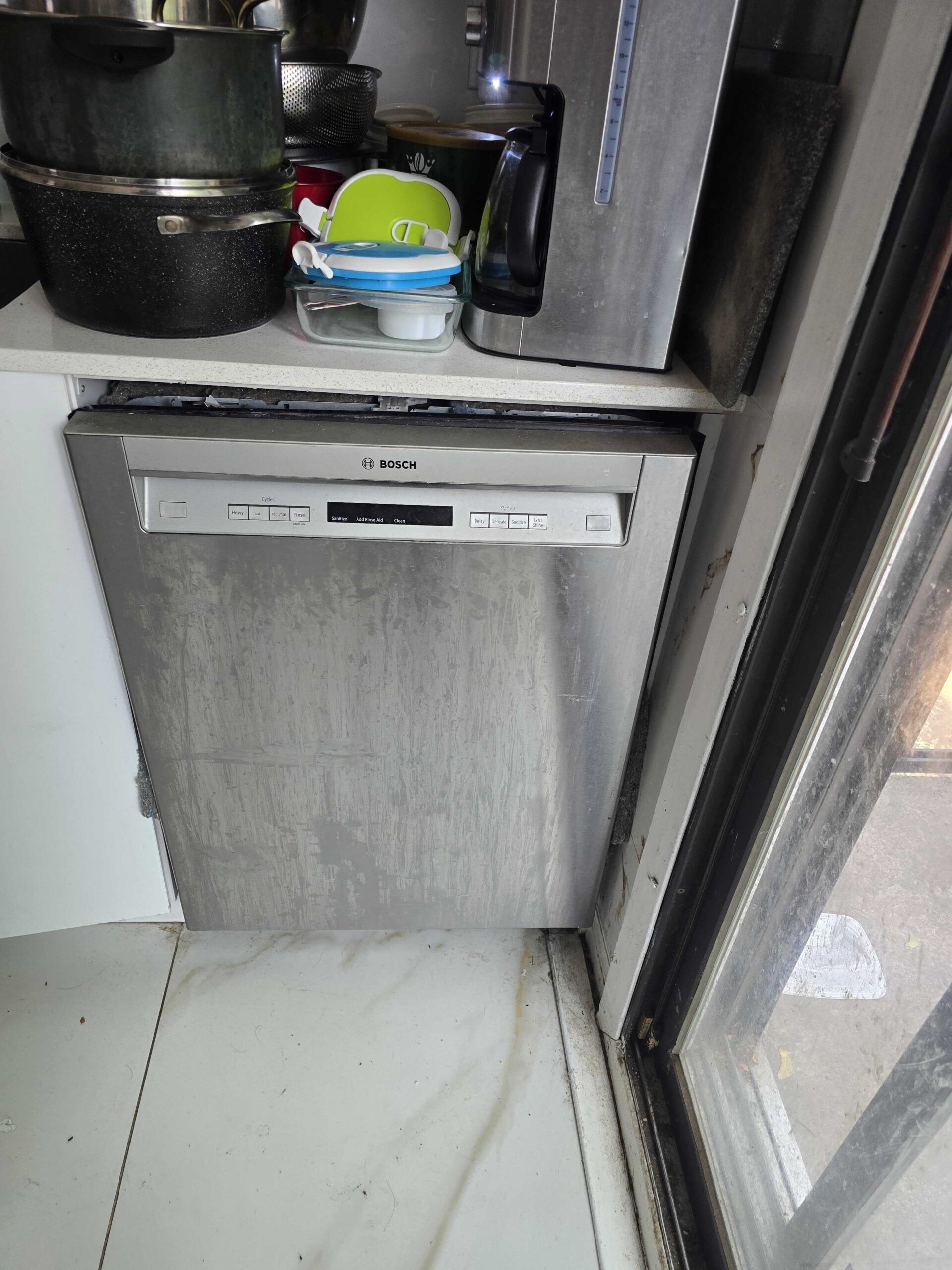 dishwasher door latch broken